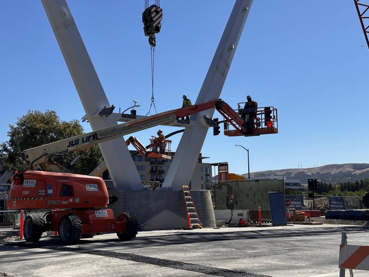 City workers weld parts of the bridge together at the intersection of the Iron Horse Trail and Bollinger Canyon Road. The new bridge is part of the $21.8 million Overcrossings Project and is expected to be completed by summer 2025.