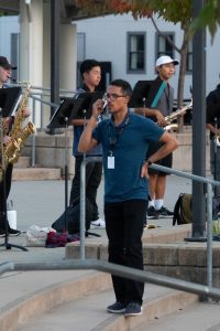 New Cal High band director Bob Grigas leads students during practice in the quad. His teaching career has spanned more than two decades.