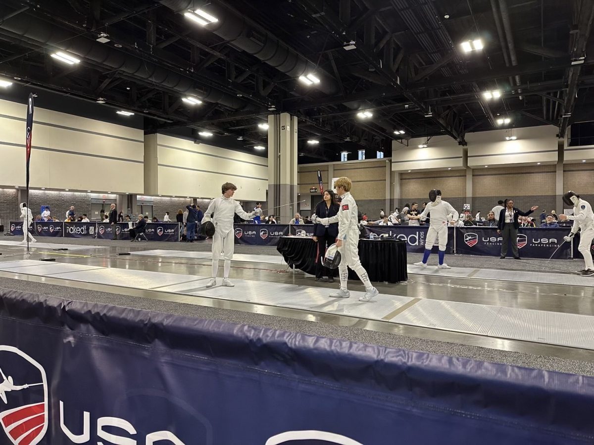 Rylan Kuo, right, gets ready to face his opponent at the 2024 Junior Para North American Cup in Charlotte, NC.