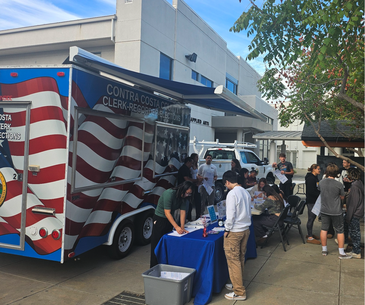 Cal High students register to vote at an election popup from the Contra Costa Elections Department that was on campus on Oct. 10.