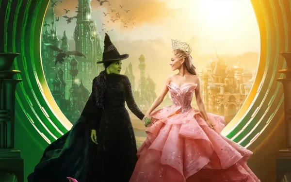 Elphaba (left) joins hands with Glinda in the "Wicked" movie.