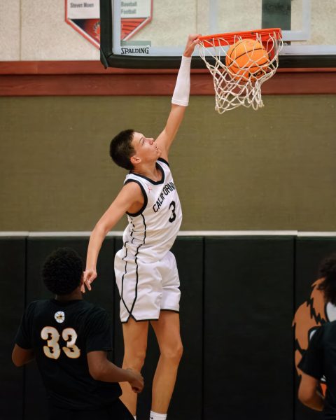 Junior captain Brayde Kuykendall throws down a dunk during Cal’s 67-46 win over Antioch on Nov. 19, which was Next Level Basketball Night. The Grizzlies, 22-4 as of Feb. 10, are one of the fastest teams to reach 20 wins in Cal history.