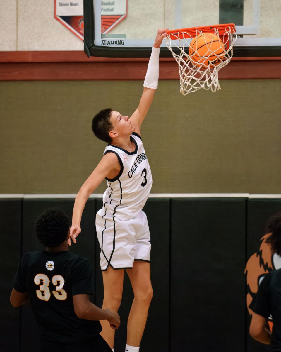 Junior captain Brayde Kuykendall throws down a dunk during Cal’s 67-46 win over Antioch on Nov. 19, which was Next Level Basketball Night. The Grizzlies, 22-4 as of Feb. 10, are one of the fastest teams to reach 20 wins in Cal history.